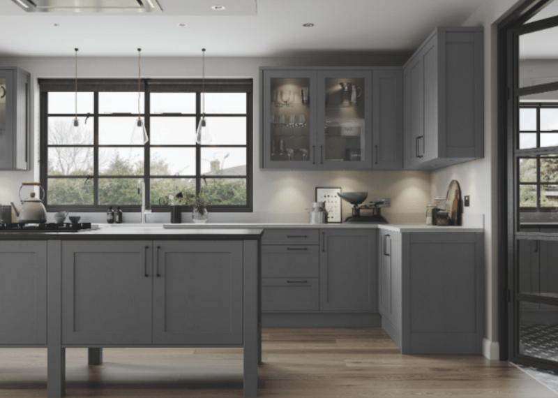 dark-grey-shaker-cabinets-with-glass-display-units Corner Carousels, Pull-Out Larders and Drawer Systems: What a Custom Storage Build Includes