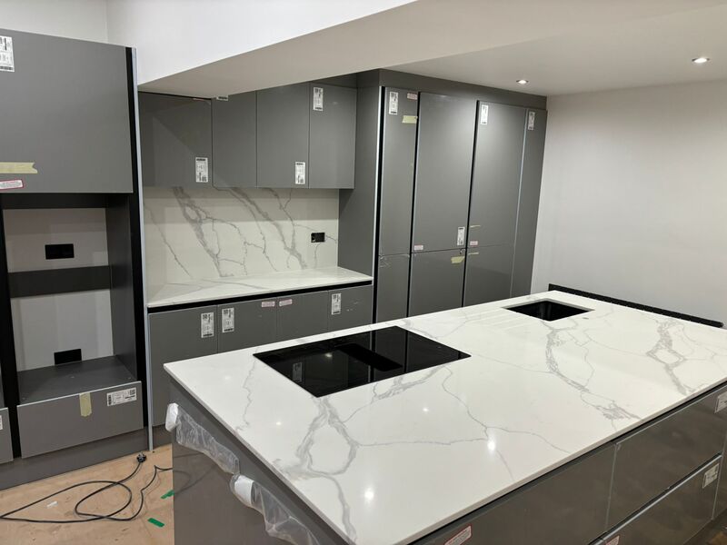 grey-units-white-marbled-quartz-worktop What's Included When We Fit Your New Worktop