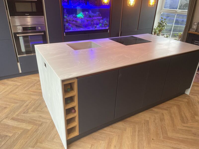 marbled-quartz-island-wine-rack-fitted From First Call to Finished Worktop