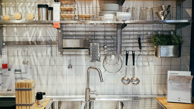 professional-tiler-working-on-floor-tiling-2-16x9-1 What the job actually looks like once you've booked it