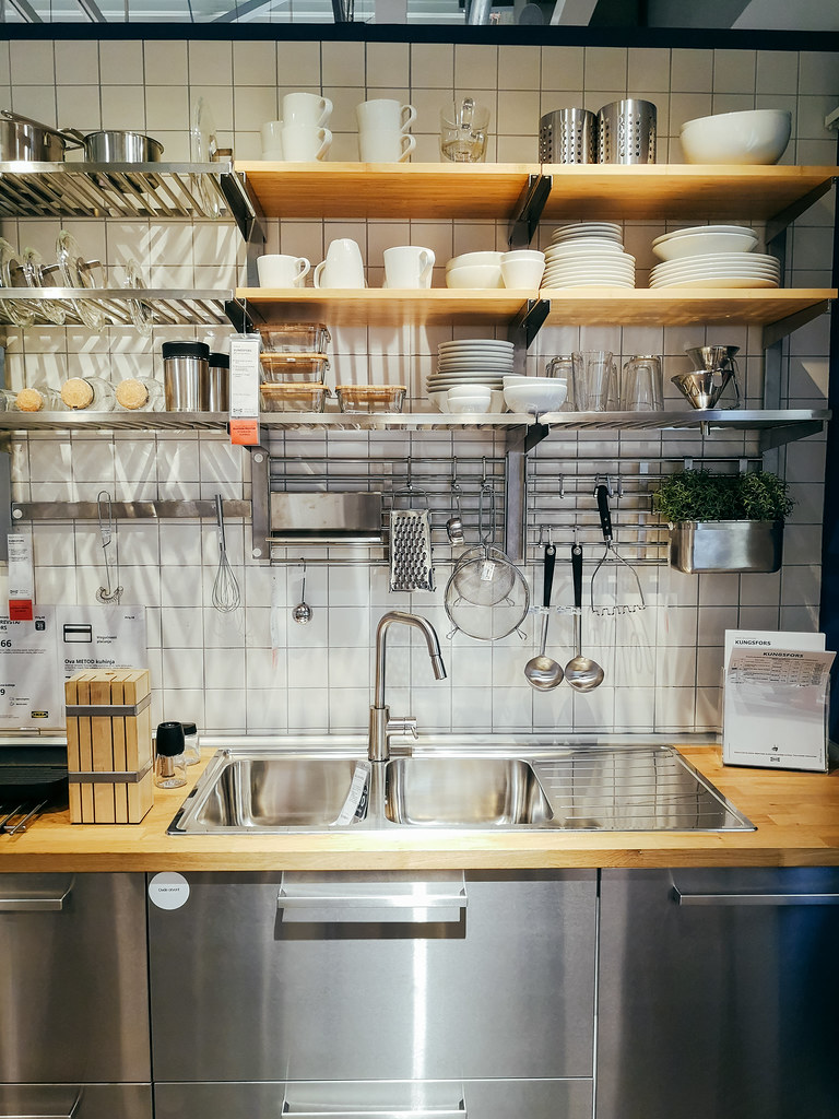 professional-tiler-working-on-floor-tiling-2 One Team Fitting Your Kitchen and Your Tiling