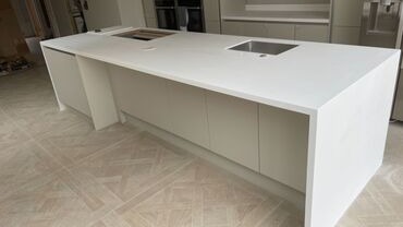 white-marbled-quartz-island-kitchen-16x9-1 What to check is actually included before you sign anything