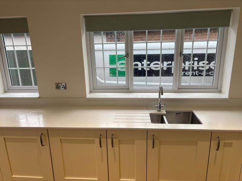 white-worktop-with-undermount-sink-by-window What's Covered in a Barnsley Worktop Fit