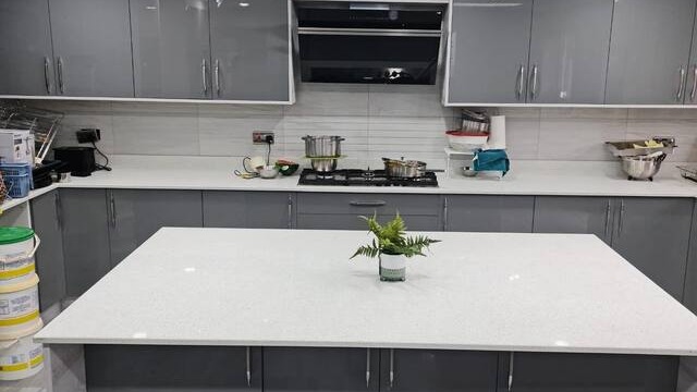 white-corian-island-top-grey-gloss-cabinets white-corian-island-top-grey-gloss-cabinets